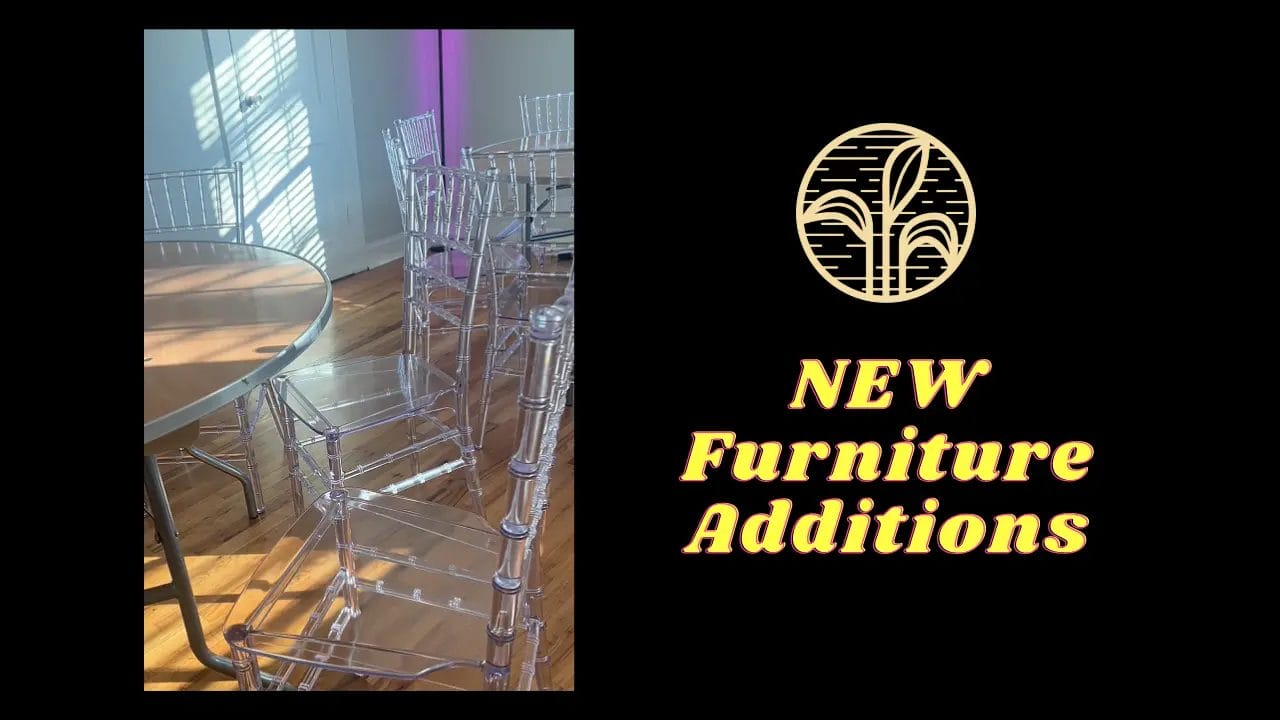 A set of transparent acrylic chairs and a round table are arranged on a wooden floor. Next to the image, text reads "NEW Furniture Additions" with an emblem above it, featuring decorative lines. The background is black with purple lighting. Huntersville event venue